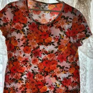 Very pretty short sleeved shirt.